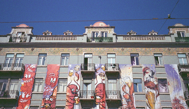 characters decorating a building